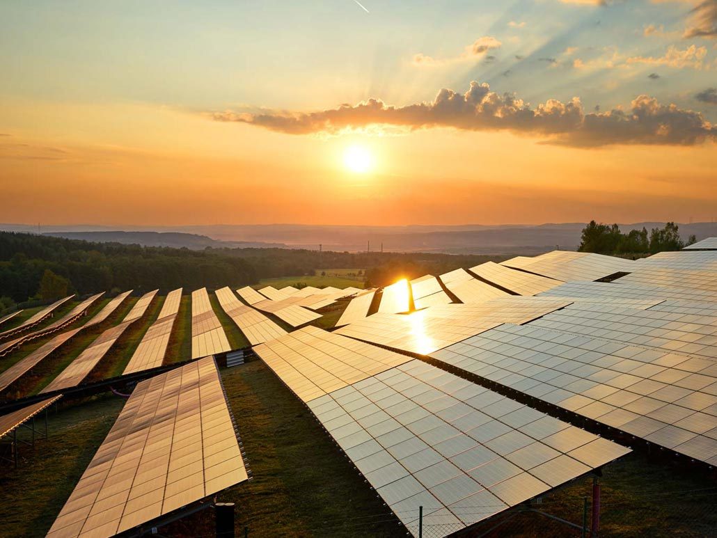 Solar PV farm at sunset in the UK countryside